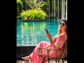  alt="Malavika Menon"