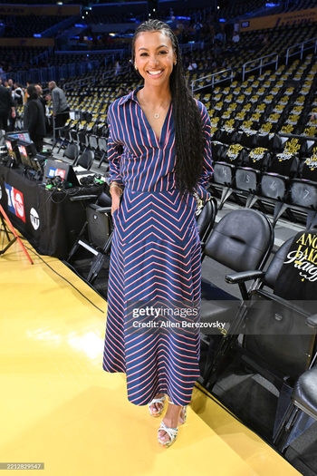 Malika Andrews