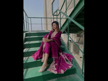  alt="Madiha Naqvi"