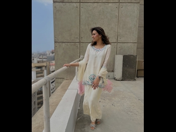  alt="Madiha Naqvi"