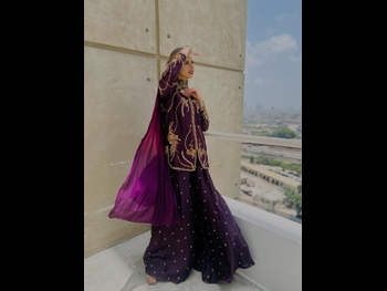 alt="Madiha Naqvi"