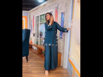 alt="Madiha Naqvi"