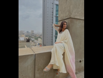  alt="Madiha Naqvi"