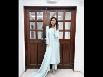  alt="Madiha Naqvi"