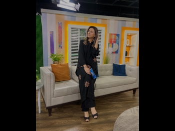  alt="Madiha Naqvi"