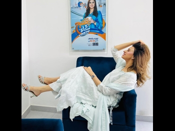  alt="Madiha Naqvi"
