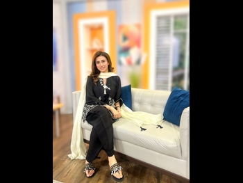  alt="Madiha Naqvi"