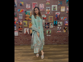  alt="Madiha Naqvi"