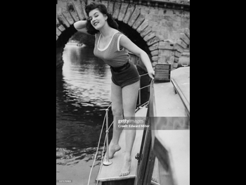  alt="June Wilkinson"